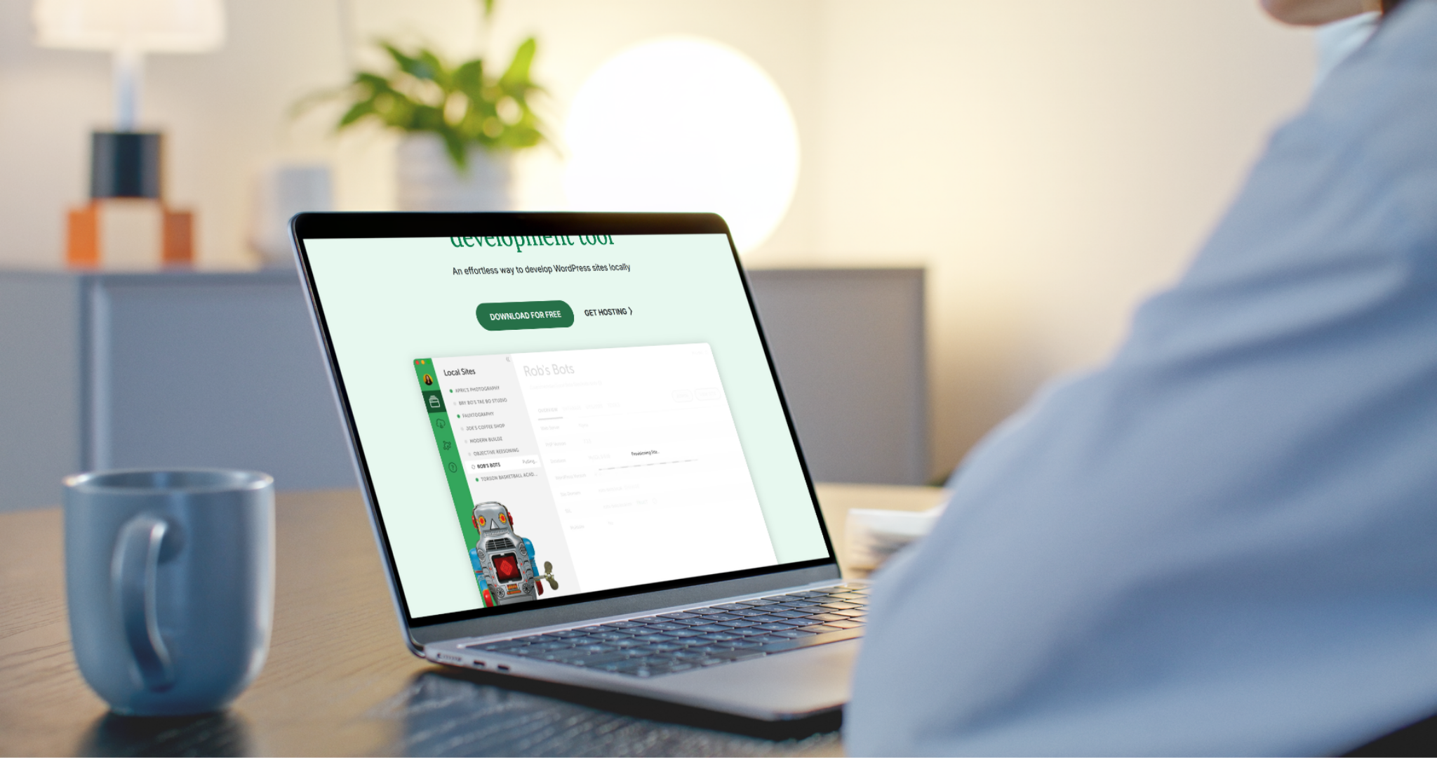 Person using laptop with website displayed